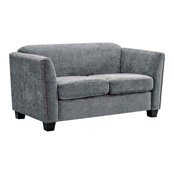 Grey fabric sofa with metal stud detailing and wooden legs on white background