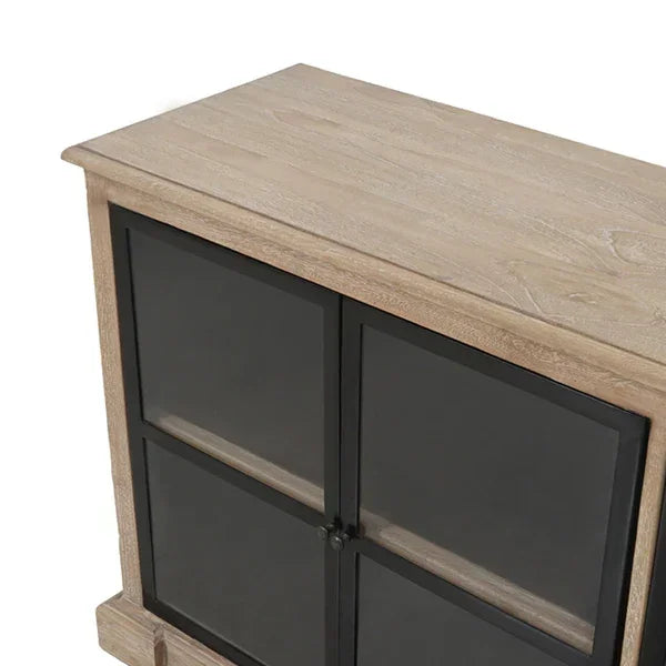 Wooden storage cabinet with black glass doors, closeup of top and front panel