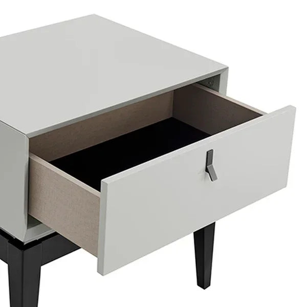 Grey bedside table with open drawer and black legs, modern bedroom furniture