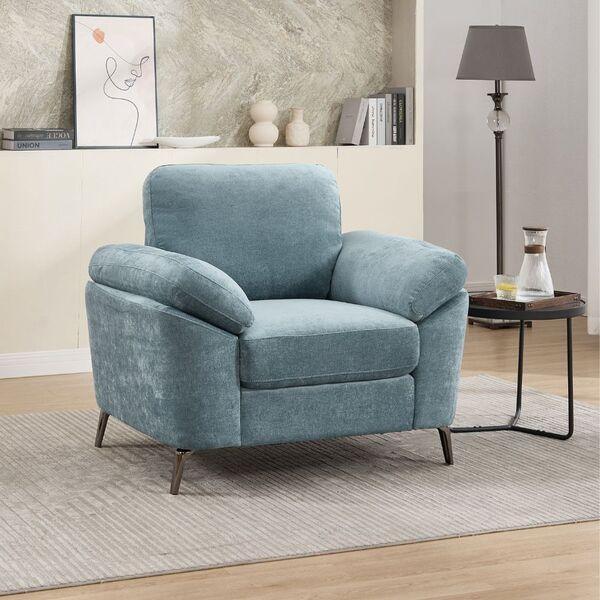Light blue fabric armchair with wide cushions on metal legs in modern living room setting