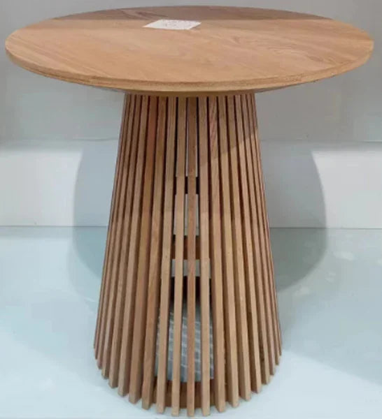 Round wooden side table with slatted base and natural finish on light background
