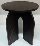 Dark wood side table with round top and arched cutout base on white background