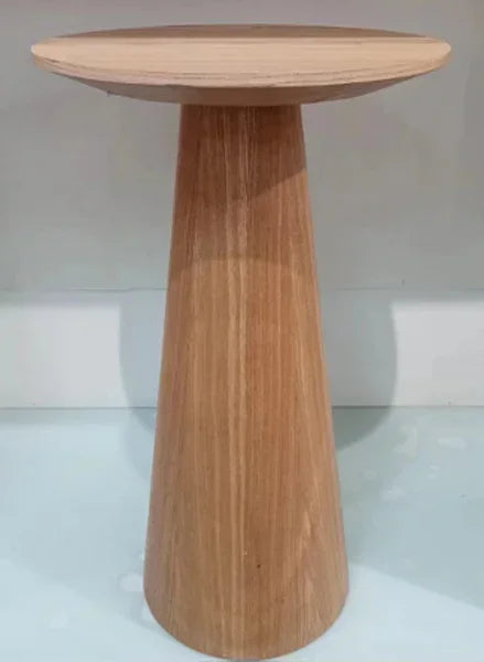 Round oak side table with tapered base against a light background