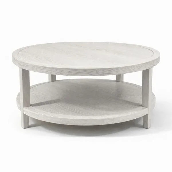 Round wooden coffee table with lower shelf in light oak finish