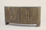 Curved wooden sideboard with circular patterns and brass handles