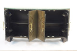 Curved wooden cabinet with open double doors and brass handles showing shelves