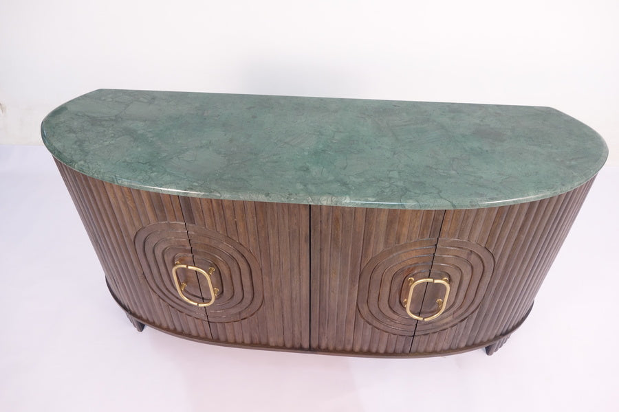 Curved wooden sideboard with green marble top and brass ring handles
