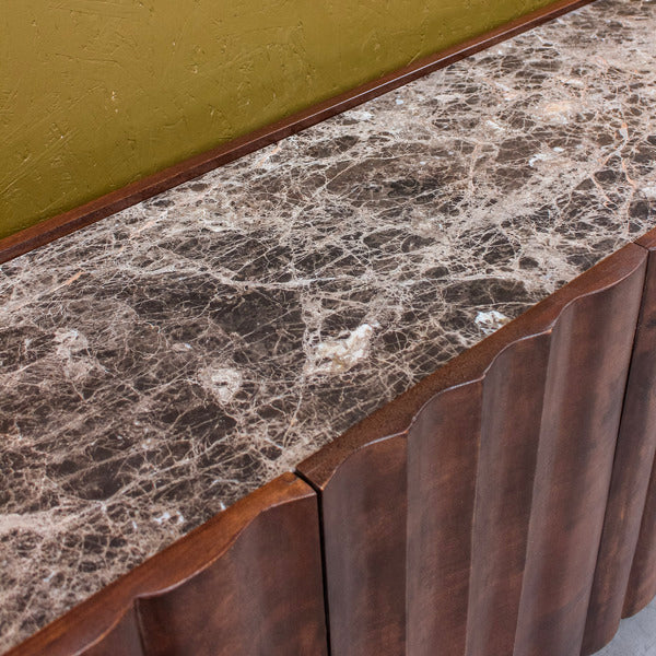 Brown marble top with dark carved wooden doors sideboard