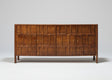 Wooden sideboard with carved geometric panel doors and four legs | Home Centre Direct UK