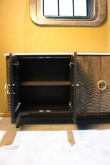 Dark wooden sideboard with two open doors revealing interior shelves