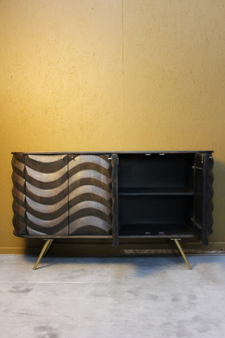Dark wood sideboard with four doors, one open showing two shelves