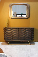 Dark wood sideboard with four curved front doors and gold legs