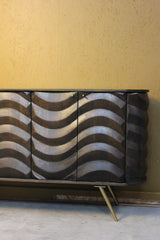 Wooden sideboard with four doors featuring wave pattern design on front