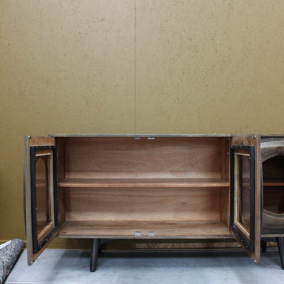 Wooden sideboard with open glass doors and single shelf inside