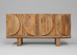 Wooden sideboard with four doors featuring oval carved details | Home Centre Direct UK