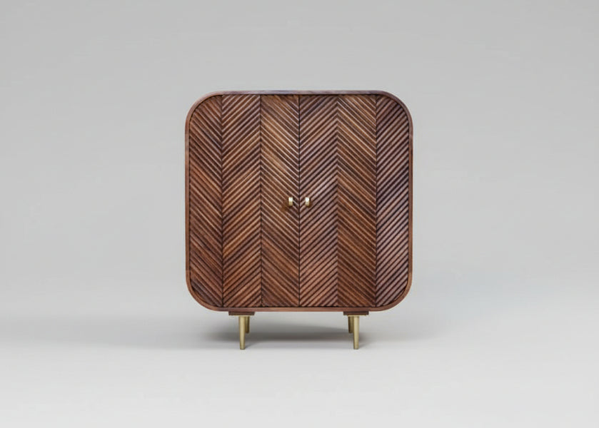 Dark wood cabinet with layered chevron pattern and brass legs | Home Centre Direct UK