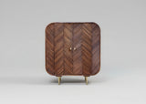 Dark wood cabinet with layered chevron pattern and brass legs | Home Centre Direct UK