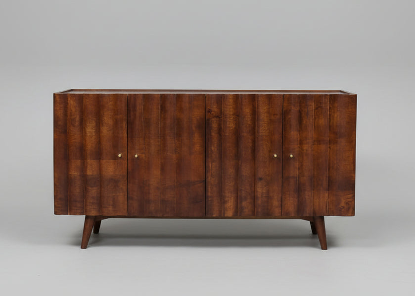 Wooden sideboard with four doors and carved vertical panel design | Home Centre Direct UK