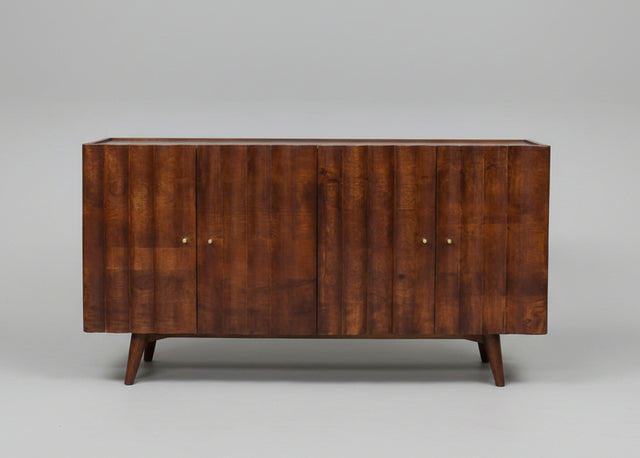 Wooden sideboard with four doors and carved vertical panel design | Home Centre Direct UK