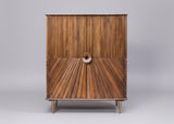 Wooden cabinet with vertical and diagonal carved patterns on two doors | Home Centre Direct UK