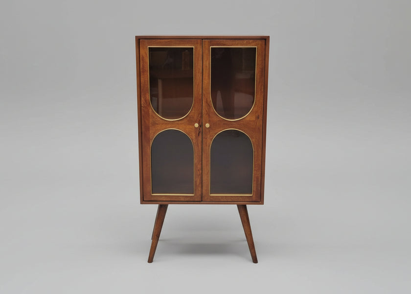 Wooden cabinet with two glass doors and angled legs in warm brown tones | Home Centre Direct UK