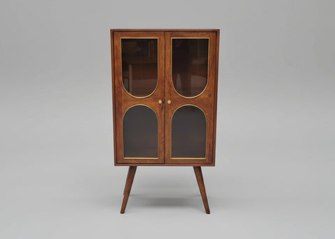 Wooden cabinet with two glass doors and angled legs in warm brown tones | Home Centre Direct UK