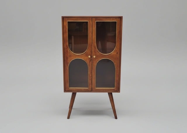 Wooden cabinet with two glass doors and angled legs in warm brown tones | Home Centre Direct UK