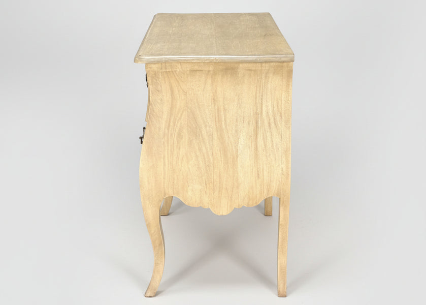 Side view of curved wooden chest with two drawers and cabriole legs
