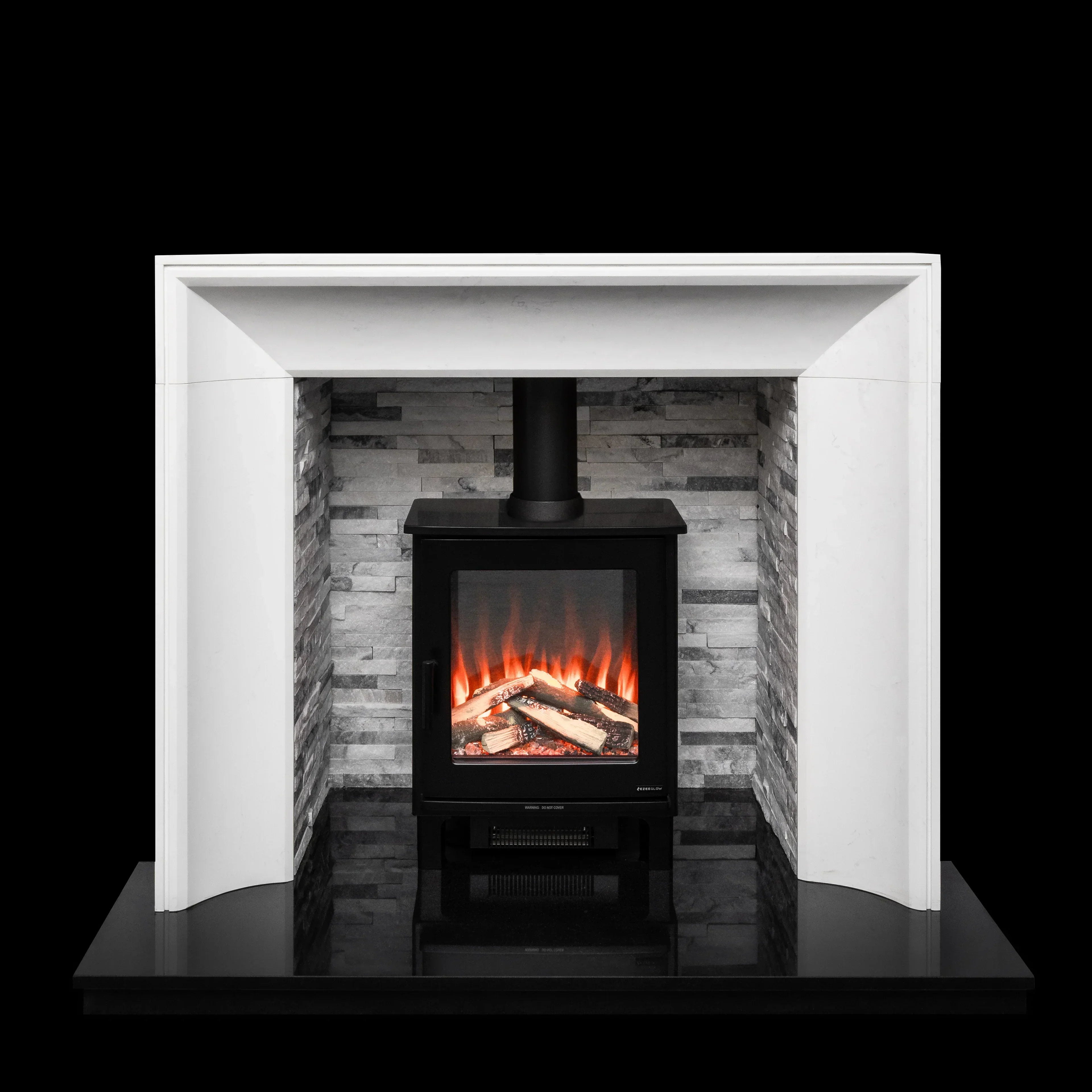 Electric fireplace stove with white surround and grey stone effect backing