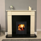 Cream fireplace surround with black wood burning stove and visible flames, modern living room