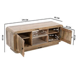 Hudson TV Cabinet made of carved mango wood in a stylish living room setting