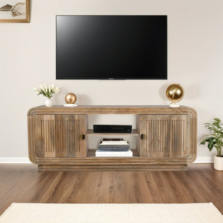 Hudson TV Cabinet made of carved mango wood in a stylish living room setting