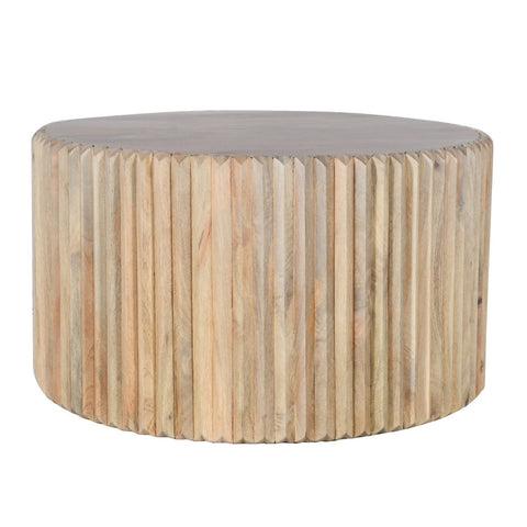Round coffee table made of carved mango wood, perfect for living room decor