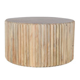 Round coffee table made of carved mango wood, perfect for living room decor