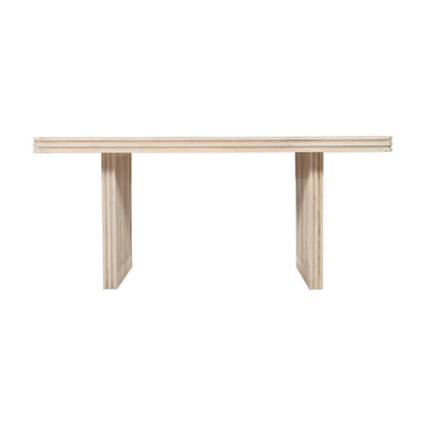 Hudson side table made of carved mango wood in a stylish setting