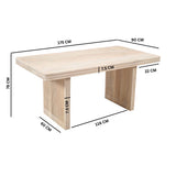 Hudson side table made of carved mango wood in a stylish setting