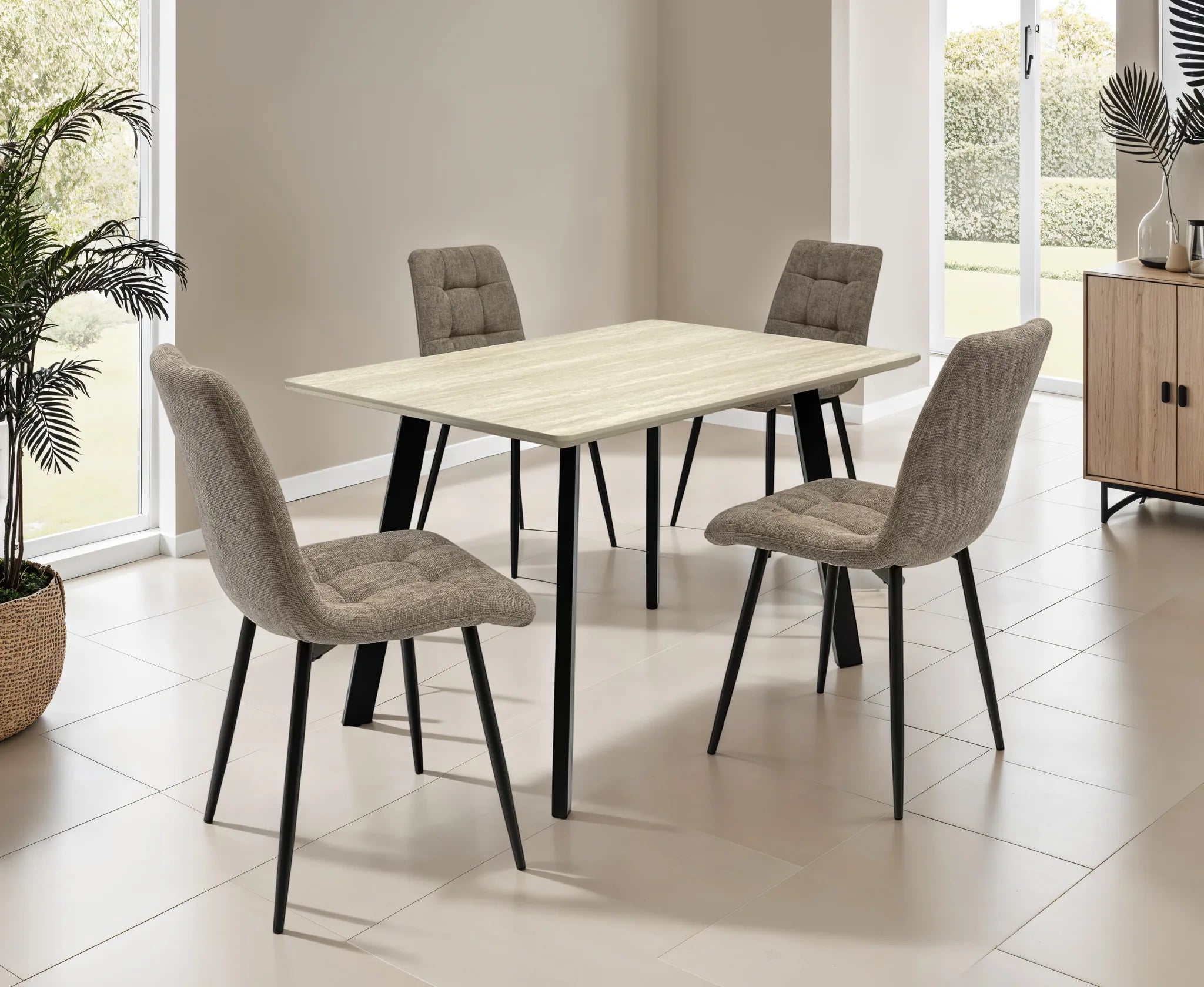 Dining table set with four chairs in a bright room with large windows.