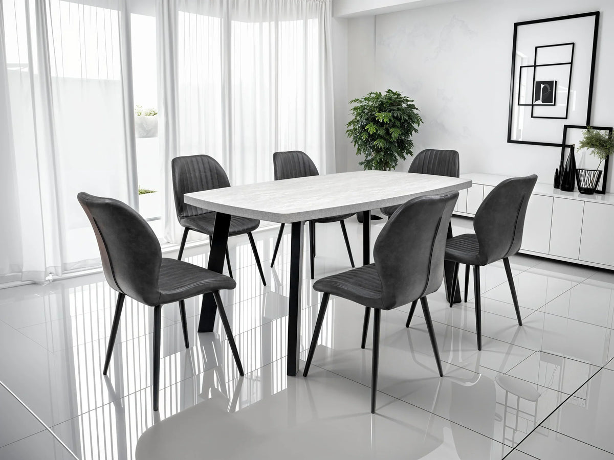 Modern dining table set with six grey upholstered chairs in bright minimalist dining room