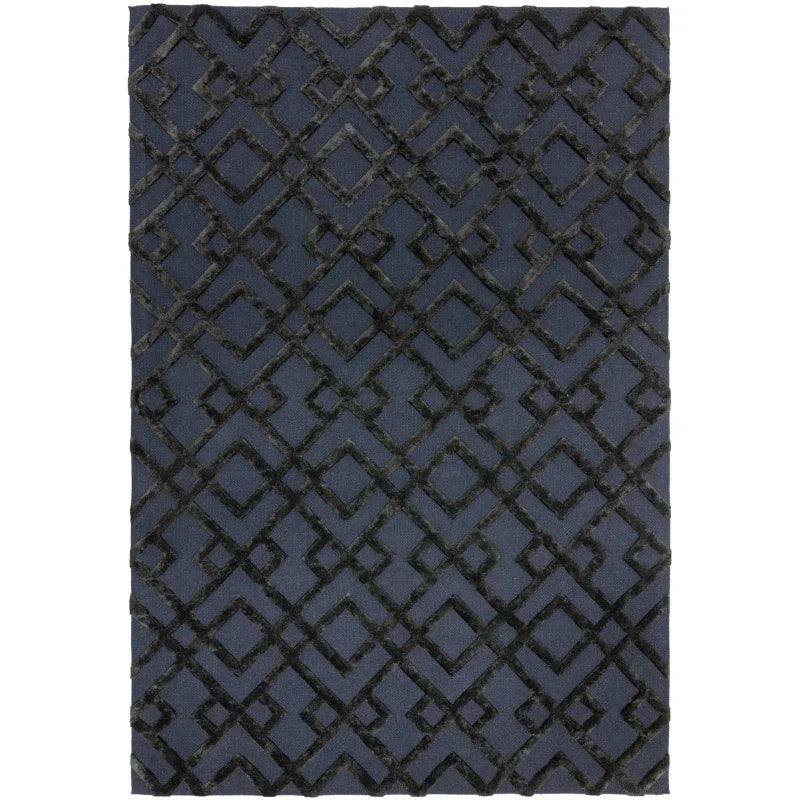 Navy geometric area rug with raised diamond pattern and textured surface