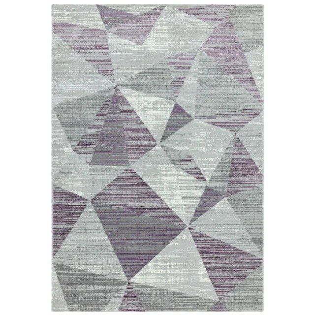 Geometric area rug with purple, grey and white shapes on a modern pattern background