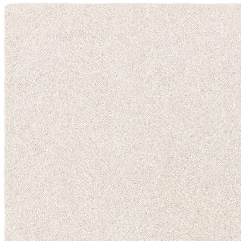 close up of cream sofa fabric texture showing soft upholstery material