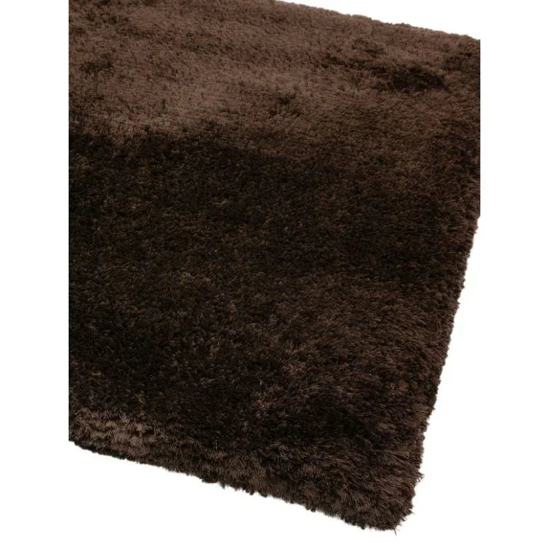Brown shaggy rug with thick pile corner detail