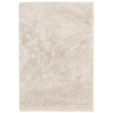 Cream shaggy rug with thick pile texture, rectangular shape, overhead view