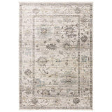 Grey and beige area rug with subtle floral pattern and distressed finish