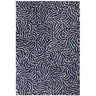 Navy patterned area rug with abstract silver line design