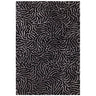 Black area rug with abstract silver line pattern, modern living room carpet design