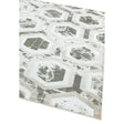 Modern area rug with grey geometric hexagon pattern on cream background