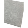 Light grey patterned rug with subtle floral details and soft textured finish