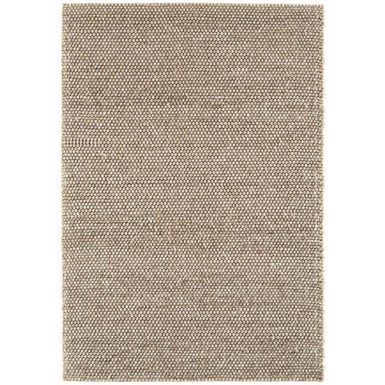 Natural jute rug with textured woven pattern and neutral beige tones