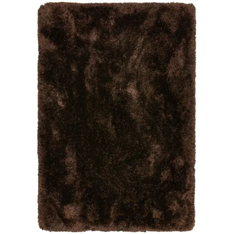 Dark brown shaggy rug with thick pile and soft texture, shown from above